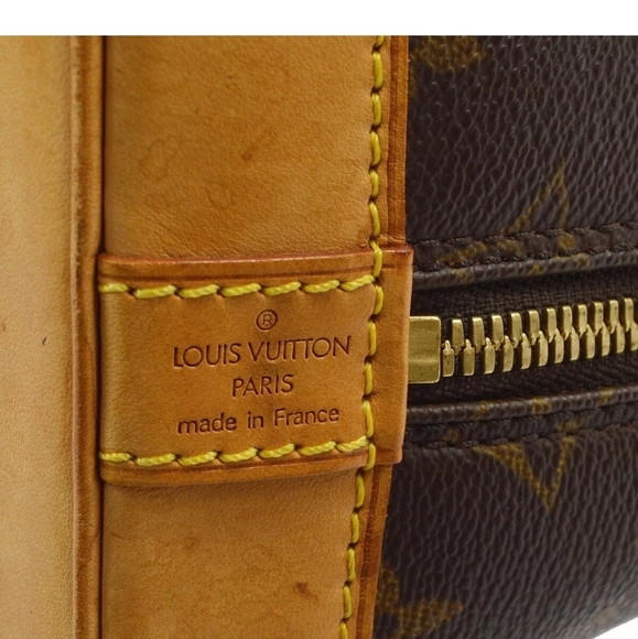 LOUIS VUITTON Alma Monogram Handbag - Picture 5 of 9